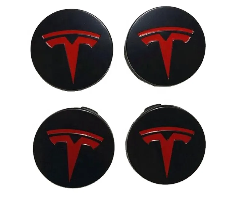 Tesla - vanteen keskikupit mustat punaisella logolla (4kpl)