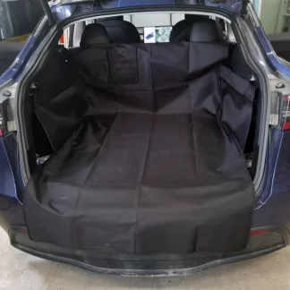Lemmikkisuoja takakonttiin - Tesla Model Y